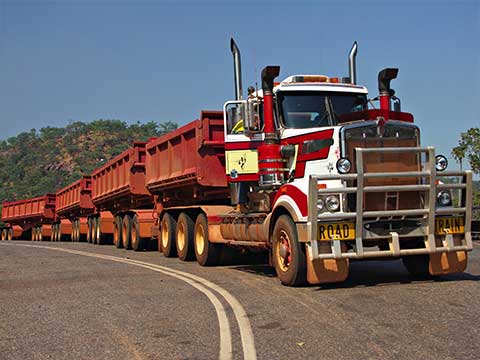 Long truck with multiple trailers nearing the end of its life